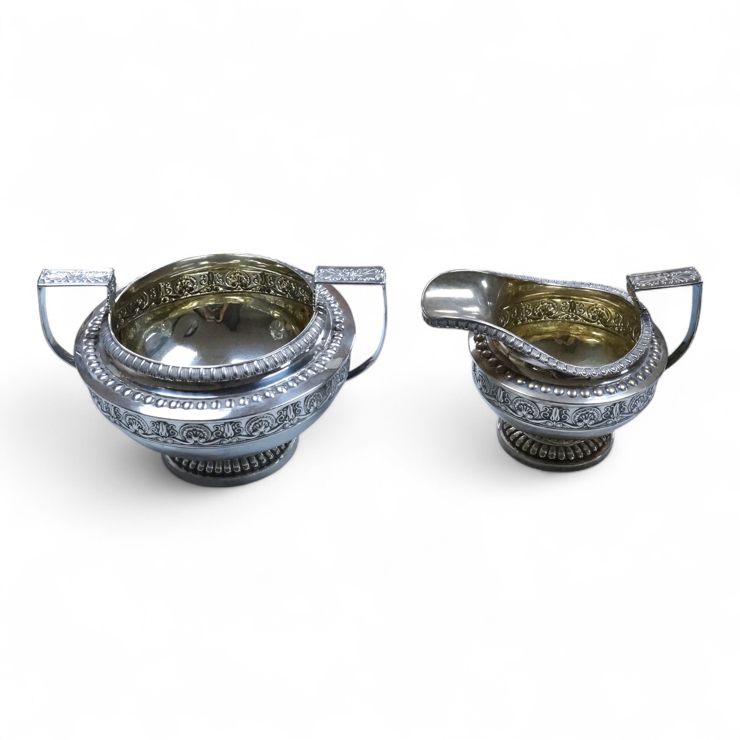 A George III Scottish silver two handled sugar bowl and matching cream jug, Robert Gray & Son, Edinburgh, 1814, sugar bowl height including handles, 11.5cm, 22.8oz.
